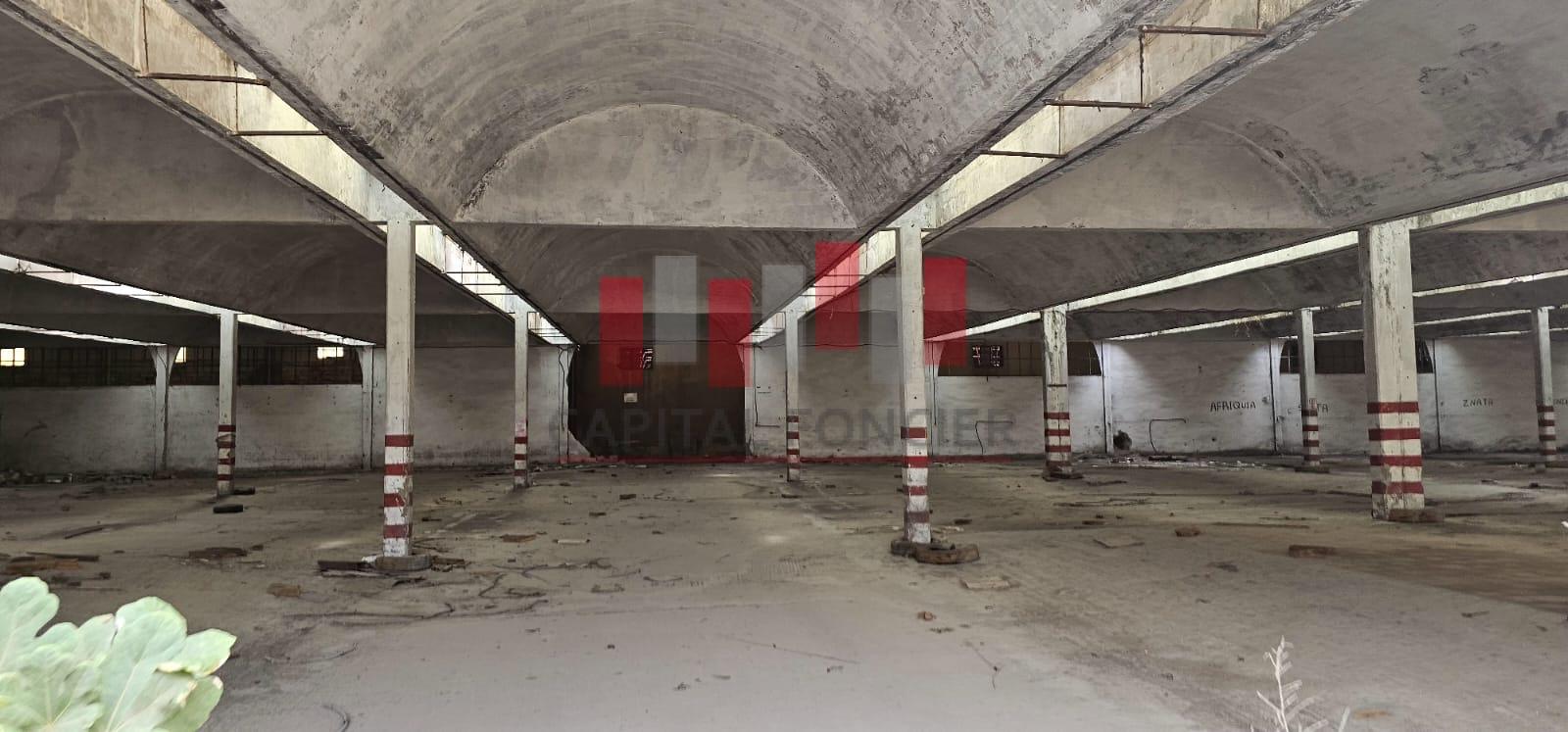 Usine  industrielle ( a rafraichir )  de 18.000 m de surface utile dont 20.000 m de surface de terrain a la vente en plein zone industrielle de ain sebaa coté Bld Chefchaouni - Photo 10